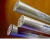 A group of three aluminum tubes on top of each other.