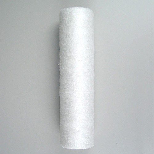 A white tube of thread on the wall.
