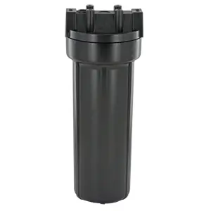 A black water filter is sitting on the floor.